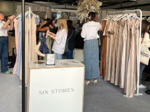 Shoppers at London pop-up by Six Stories, hosted at the ExCel London centre for bridal dresses.