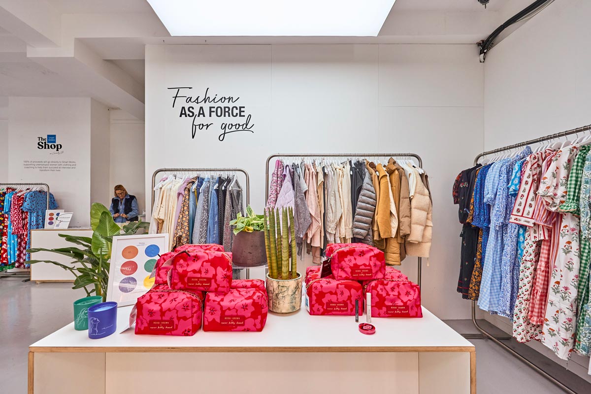 Bright clothing store interior with eco-friendly fashion concept. Smart Works has popped up in Soho, in collaboration with FoundPop furniture rentals.