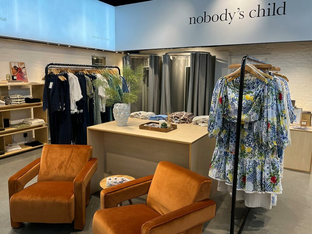 Boutique interior with sustainable clothes by Nobody's Child and pop-up rental furniture by FoundPop.