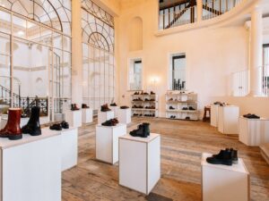 Elegant shoe store interior with hardwood floors.