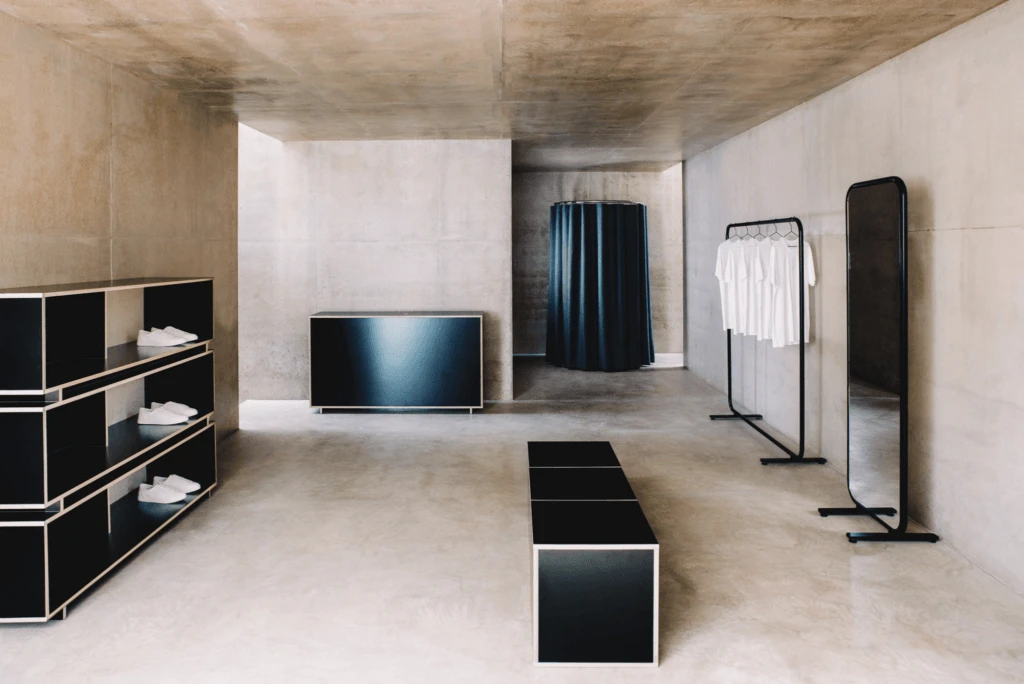 A modern and spacious pop-up shop interior in London with bright lighting and minimalist design.