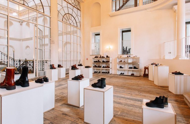Elegant shoe store interior with hardwood floors.