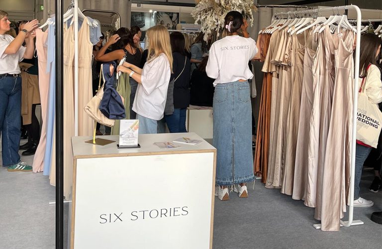 Shoppers at London pop-up by Six Stories, hosted at the ExCel London centre for bridal dresses.