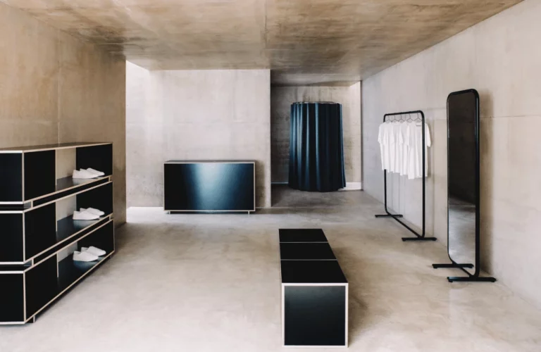 A modern and spacious pop-up shop interior in London with bright lighting and minimalist design.